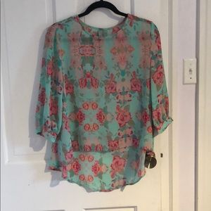 Ladies size small floral turquoise blouse